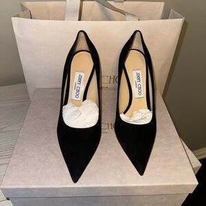 Brand New classic jimmy choo black suede pumps.